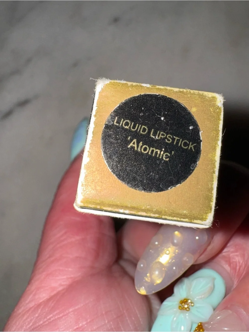 Metallic liquid lipstick